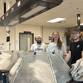 Scott, Clair, and Justin in the lab with OTC